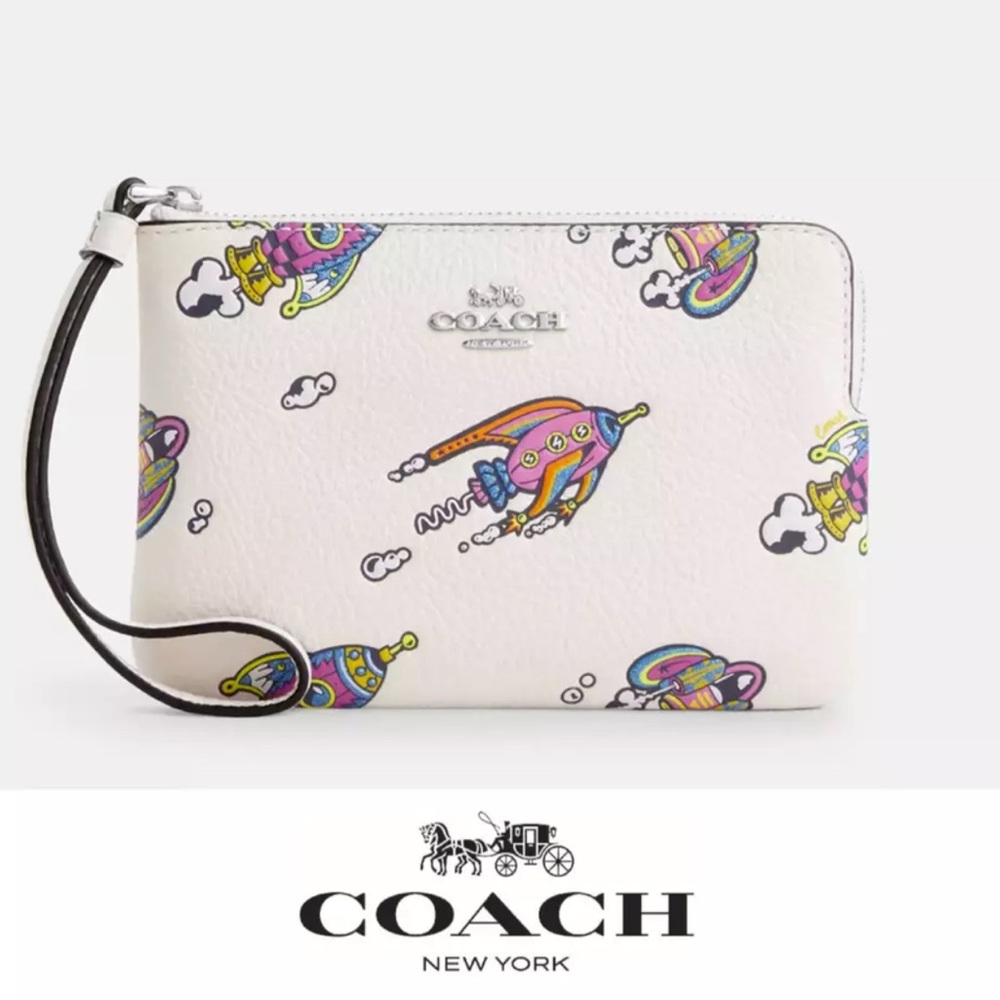 Brand new Coach Cosmic themed wristlet